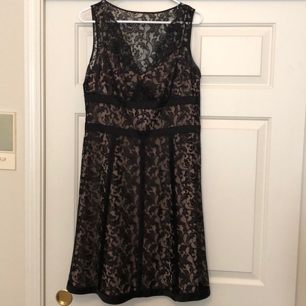 Black lace dress with nude tone Lining.